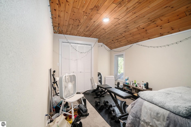carpeted bedroom with wood ceiling