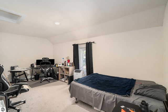carpeted bedroom with vaulted ceiling