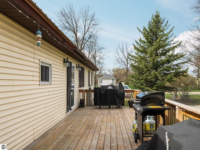 431 E Bittner Ave, Reed City, MI 49618 - deck featuring fence and grilling area