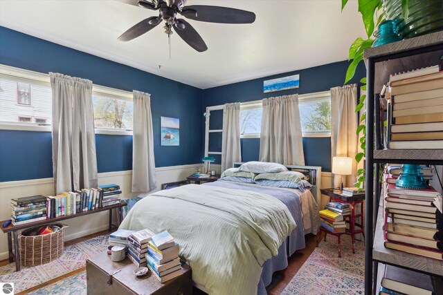 422 W Center, Alma, MI 48801 - bedroom featuring ceiling fan and wood finished floors