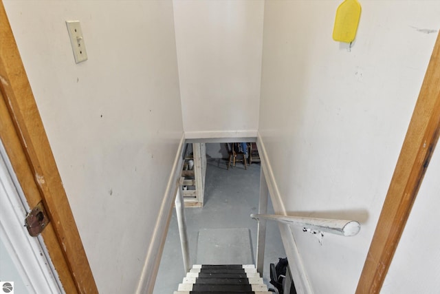 422 W Center, Alma, MI 48801 - staircase featuring concrete floors