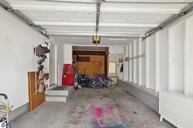 422 W Center, Alma, MI 48801 - garage featuring a garage door opener