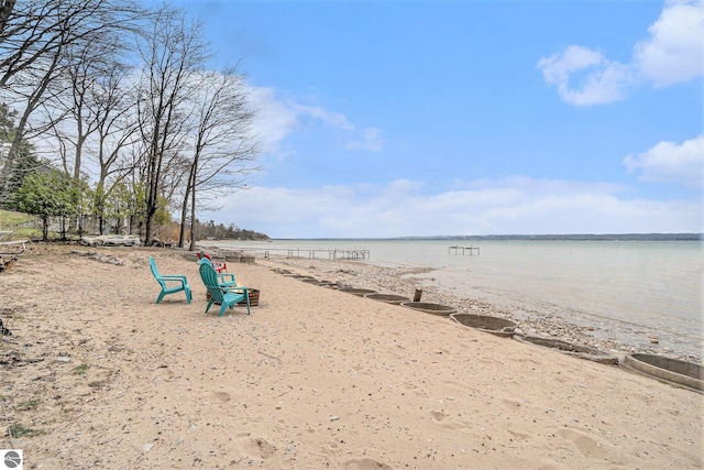 property view of water featuring a beach view