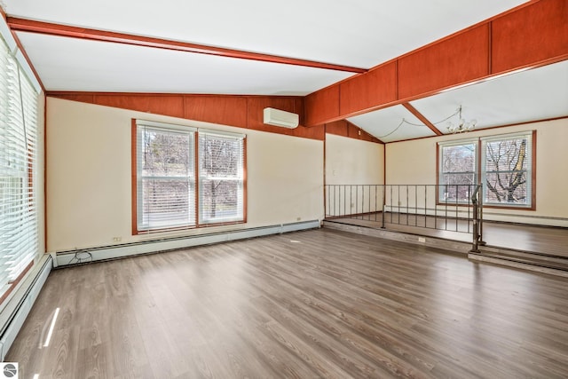 interior space featuring a baseboard radiator, a chandelier, wood finished floors, and lofted ceiling