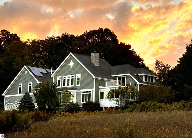 view of front of property featuring a chimney