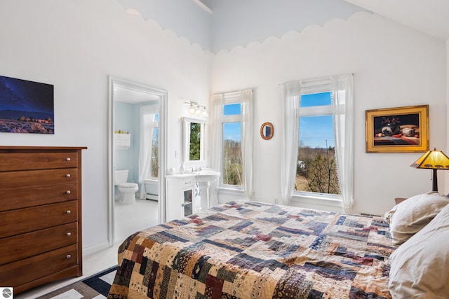 carpeted bedroom with ensuite bathroom