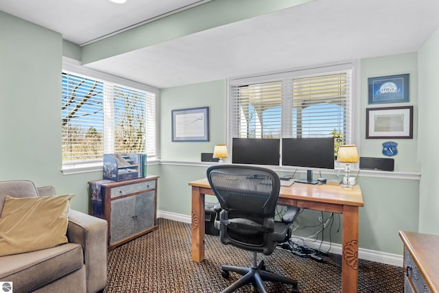 home office with baseboards and carpet
