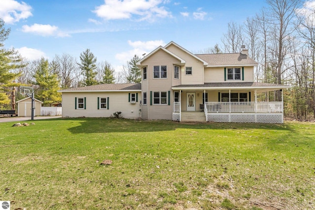 view of front of property with a shingled roof, covered porch, a chimney, and a front lawn
