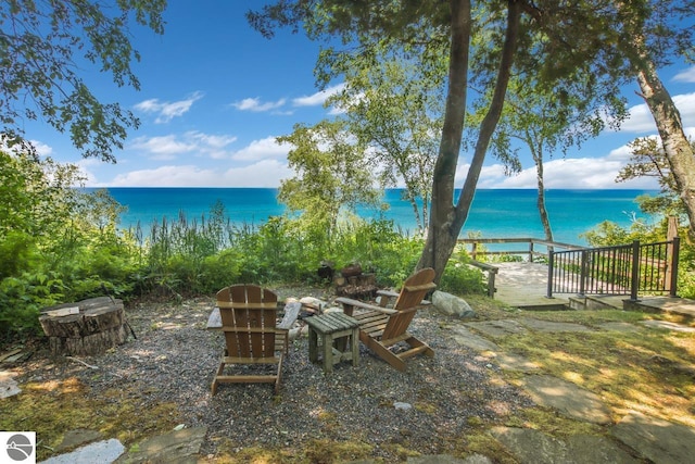 view of water feature featuring an outdoor fire pit