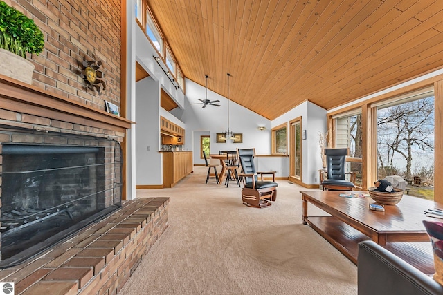 living room featuring light carpet, a brick fireplace, high vaulted ceiling, baseboards, and wooden ceiling