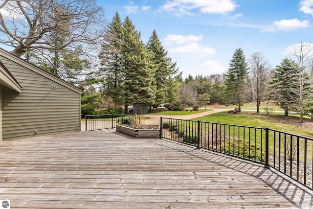 wooden deck with a yard