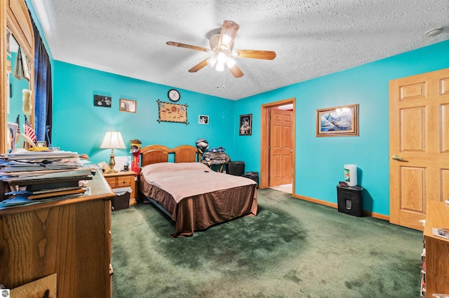 bedroom featuring baseboards, a textured ceiling, ceiling fan, and carpet