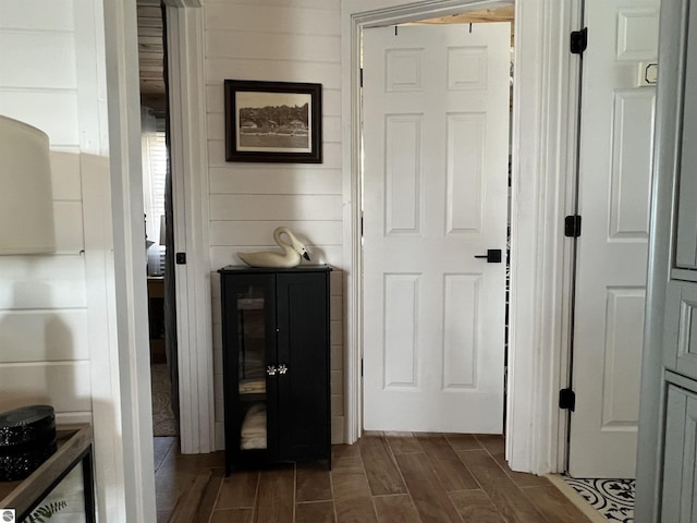hallway with wood tiled floor