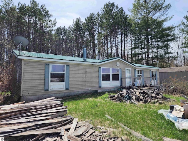 6889 Carpenter Rd, Whittemore, MI 48770 - manufactured / mobile home with metal roof