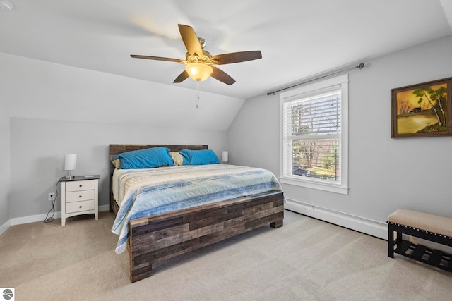 9086 N Tottenham Dr, Traverse City, MI 49685 - carpeted bedroom with a ceiling fan, baseboards, a baseboard heating unit, and lofted ceiling