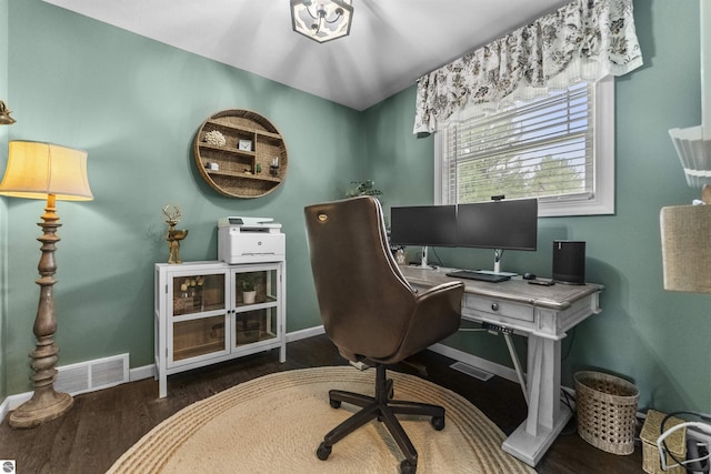 office featuring baseboards, visible vents, and wood finished floors