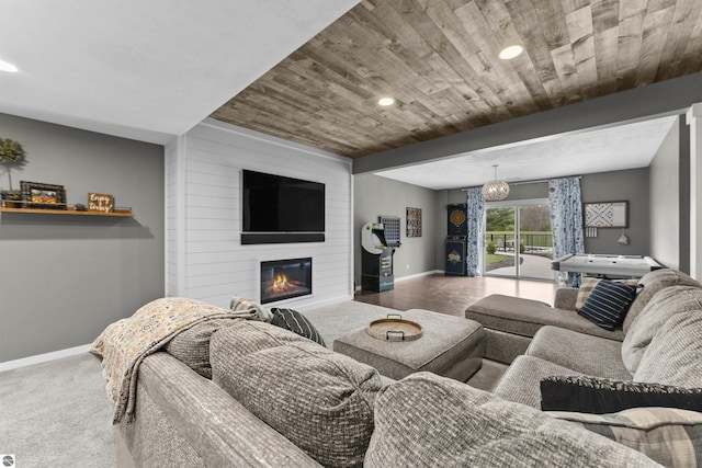 carpeted living room featuring recessed lighting, baseboards, wood ceiling, and a fireplace