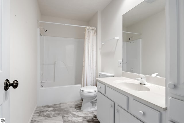 1316 Terra Rd, Traverse City, MI 49686 - bathroom with shower / tub combo, marble finish floor, toilet, and vanity