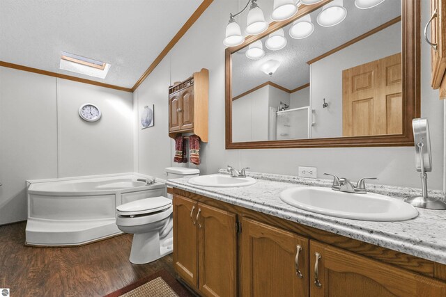 full bath with crown molding, a sink, a shower with door, and wood finished floors