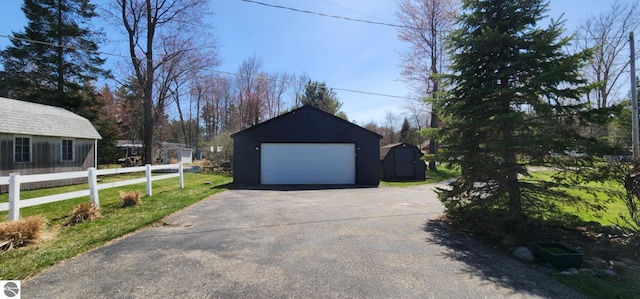 detached garage with fence