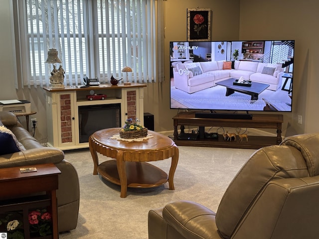 3633 Driftwood Dr, Cadillac, MI 49601 - carpeted living area with a fireplace