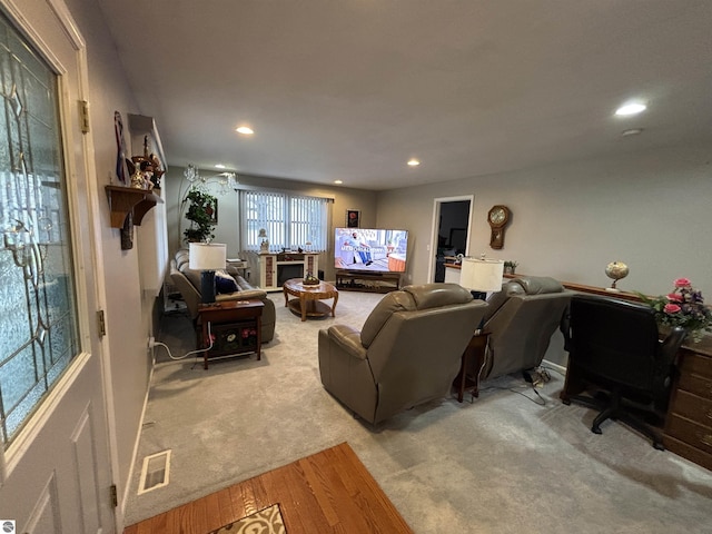 3633 Driftwood Dr, Cadillac, MI 49601 - carpeted living area with recessed lighting and visible vents