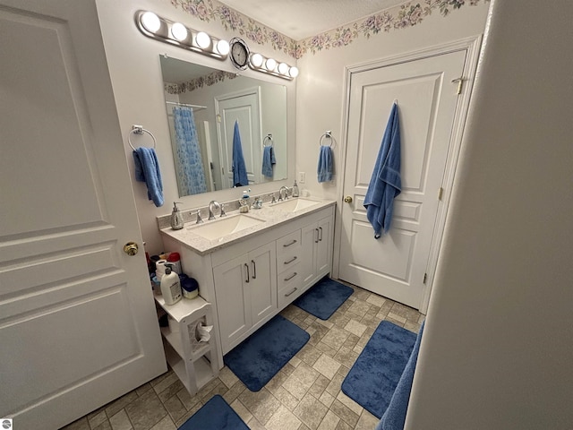 3633 Driftwood Dr, Cadillac, MI 49601 - full bathroom with double vanity, a shower with curtain, and a sink