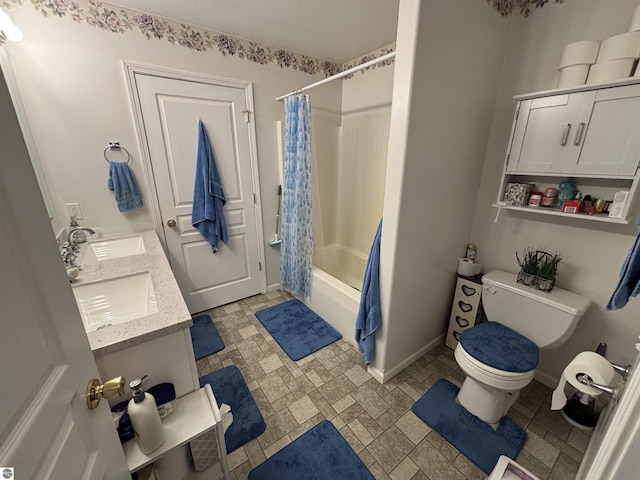 3633 Driftwood Dr, Cadillac, MI 49601 - full bath featuring baseboards, a sink, shower / tub combo, and toilet
