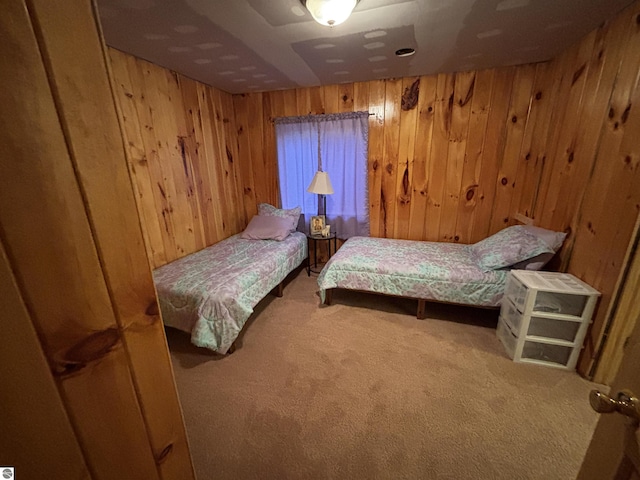 3633 Driftwood Dr, Cadillac, MI 49601 - carpeted bedroom featuring wood walls
