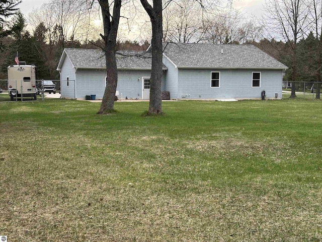 3633 Driftwood Dr, Cadillac, MI 49601 - exterior space with fence