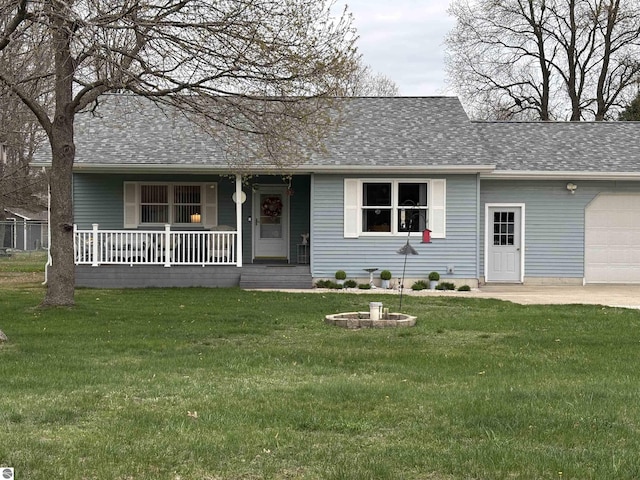 3633 Driftwood Dr, Cadillac, MI 49601 - single story home featuring roof with shingles, an attached garage, a front lawn, a porch, and driveway