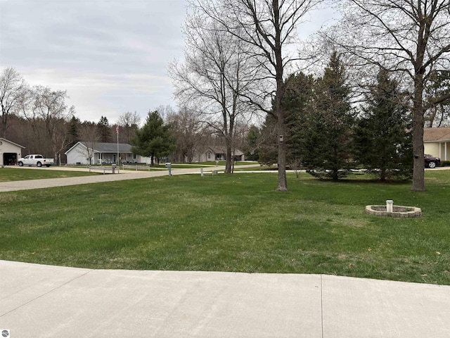 3633 Driftwood Dr, Cadillac, MI 49601 - view of yard with a residential view