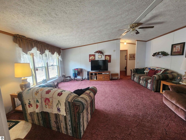 living room featuring carpet floors, ornamental molding, a textured ceiling, and ceiling fan