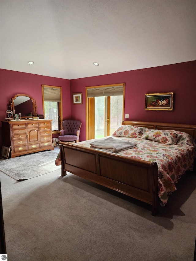 1697 Wildwood Rd, Sterling, MI 48659 - carpeted bedroom with recessed lighting and access to exterior