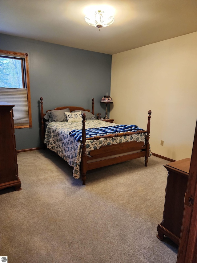 1697 Wildwood Rd, Sterling, MI 48659 - bedroom featuring baseboards and light carpet