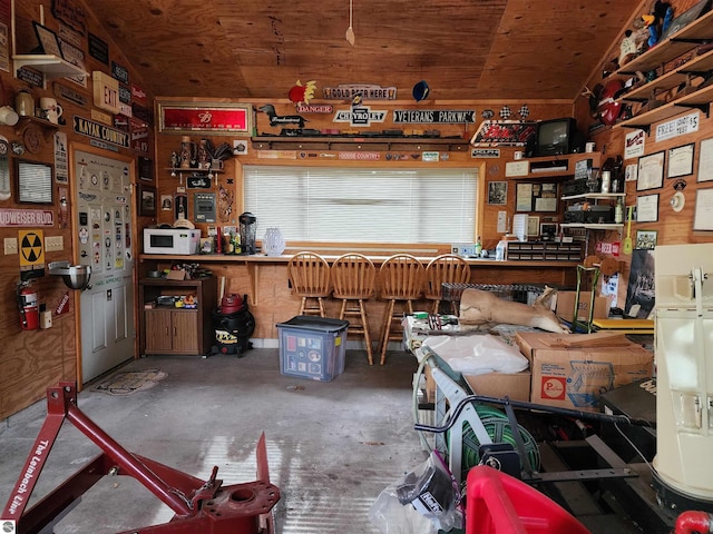 1697 Wildwood Rd, Sterling, MI 48659 - misc room with a workshop area and unfinished concrete flooring