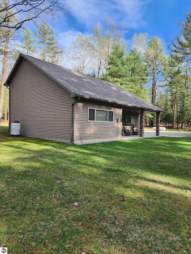 1697 Wildwood Rd, Sterling, MI 48659 - view of property exterior featuring a lawn