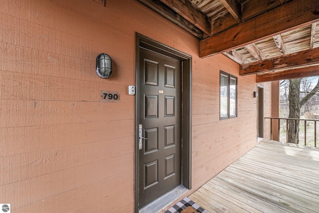 entrance to property with a porch