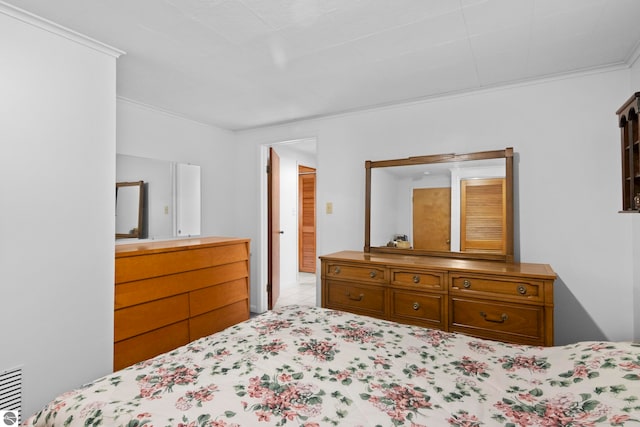 tiled bedroom with crown molding