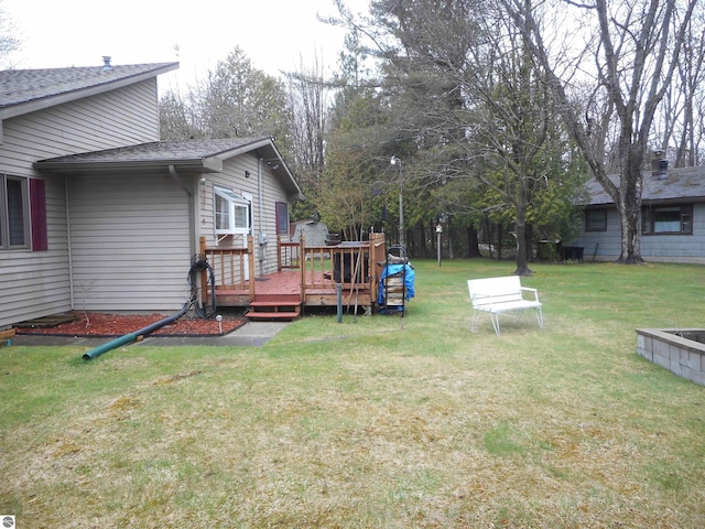view of yard featuring a deck