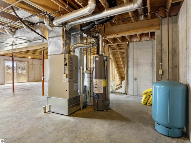 8377 Orchard Hill Rd, Beulah, MI 49617 - basement with heating unit and gas water heater