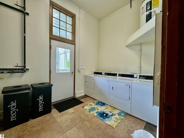community laundry room featuring separate washer and dryer