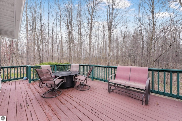 deck with outdoor dining space