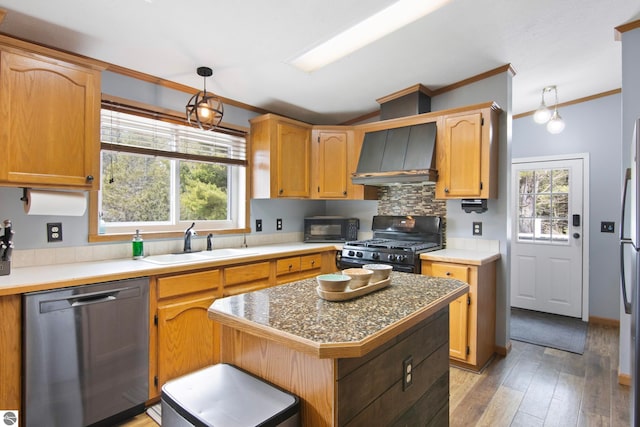 kitchen with ornamental molding, custom exhaust hood, a sink, light wood-style flooring, and black appliances