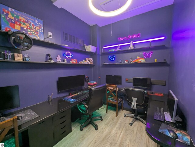 office space featuring wood finished floors