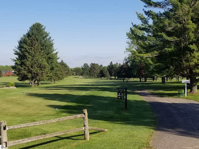 surrounding community featuring a lawn