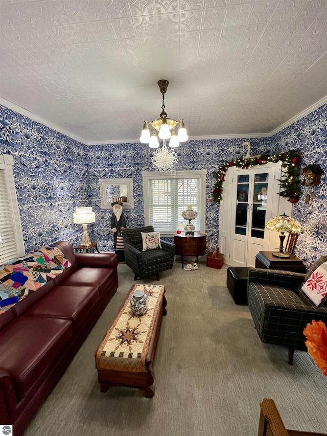 living area featuring ornamental molding, carpet, wallpapered walls, and a chandelier