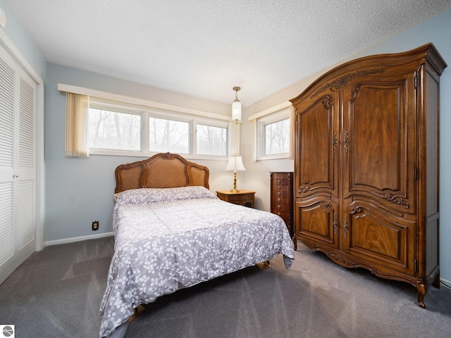 carpeted bedroom with baseboards, multiple windows, and a closet