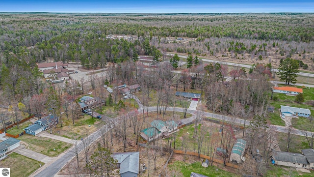 bird's eye view featuring a view of trees