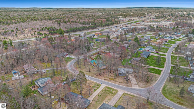 birds eye view of property with a residential view